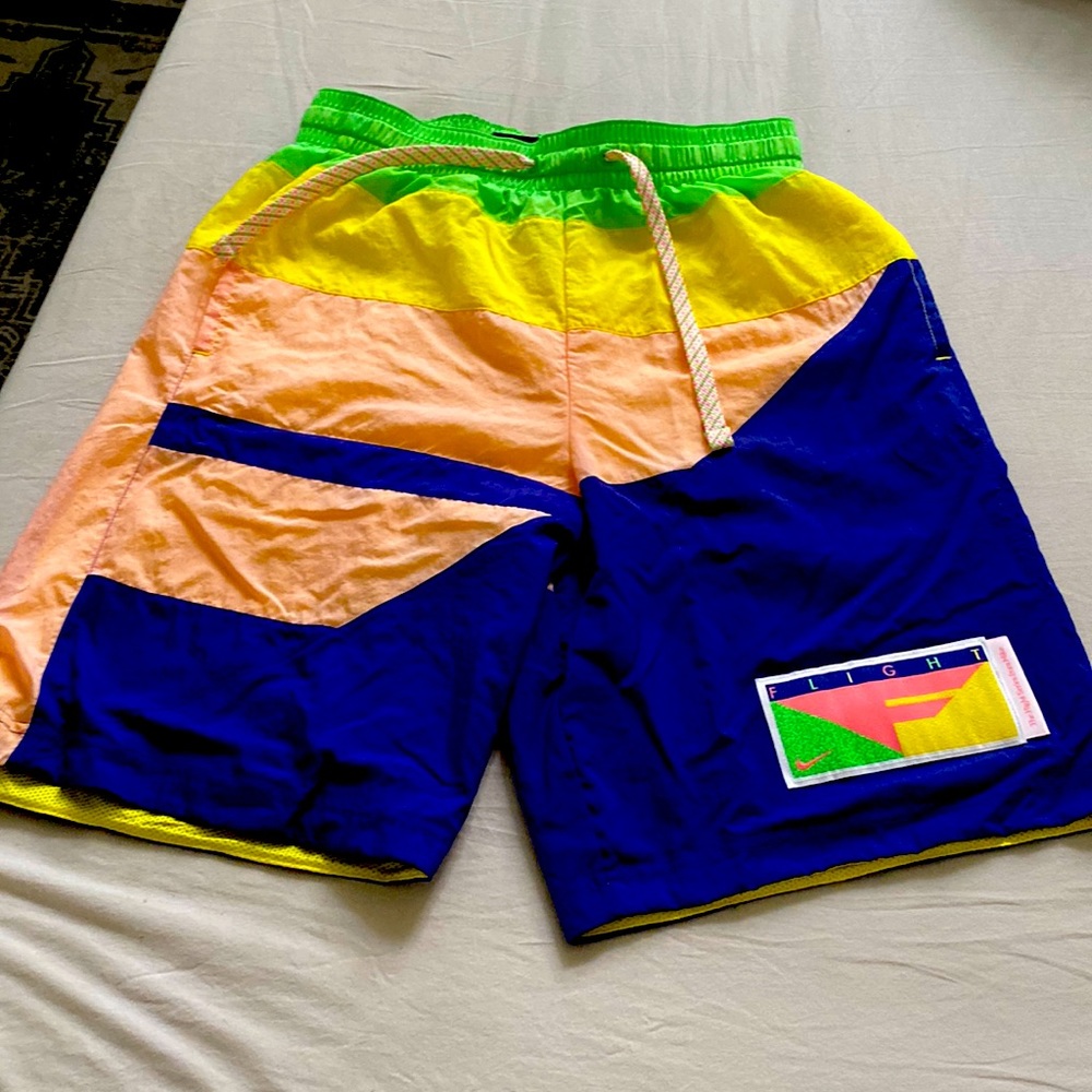 Nike Flight Shorts. Size Small. Colors Purple, Peach, Lime Green, and Yellow.